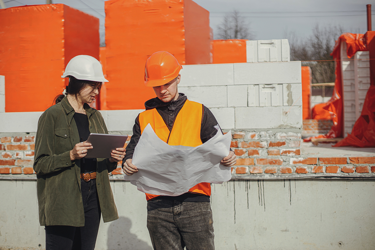 Subcontractor looking at plan